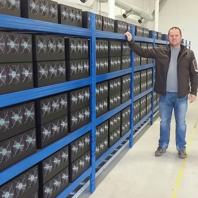 A vibrant view of an Indian mining farm setup, showcasing rows of mining rigs processing cryptocurrencies