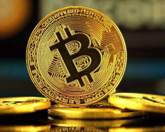 Bitcoin mining rig nestled within a vast mining farm, highlighting large-scale crypto mining operations